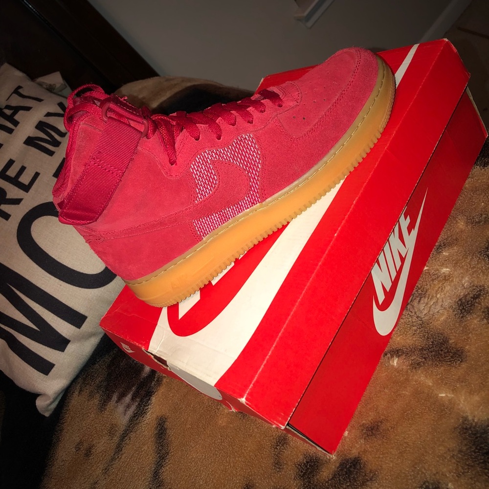 Red suede Air Force 1’s